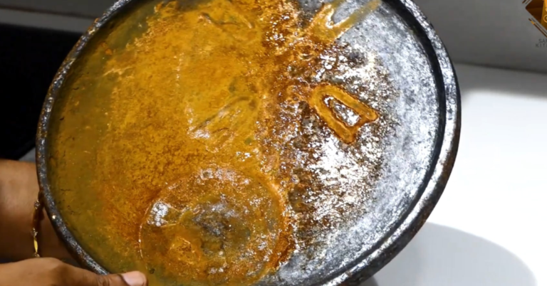 Cleaning the rusted pan